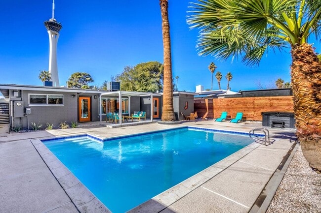 Photo - Vibrant, fully-furnished home near downtown with modern updates, pool & spa with flexible stay op...