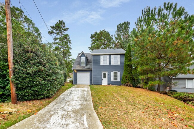 Photo - Modern 2-Story Home with Deck & Private Wooded Backyard
