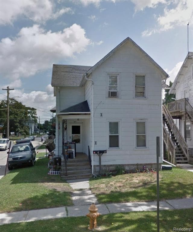 Building Photo - 801 E 4th St Unit 2 (Upstairs)