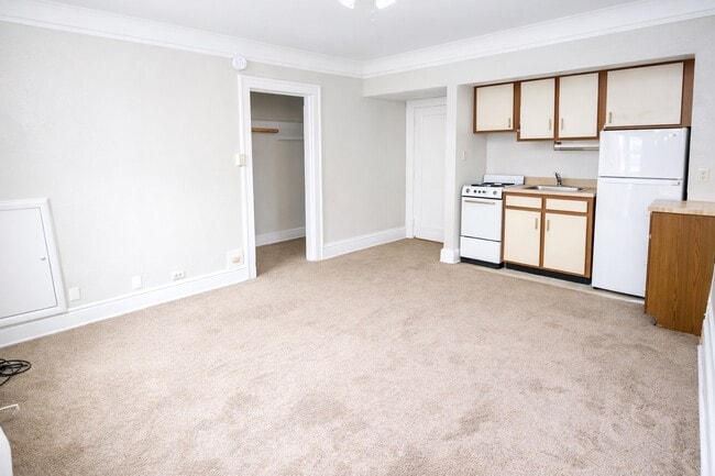 Carpeted Studio - Oakland Apartments