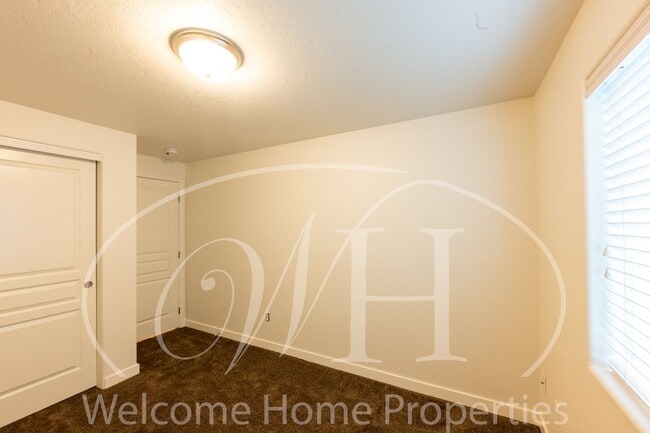 Photo - Single Story 3 Bedroom Home with Gas Fireplace and Covered Patio