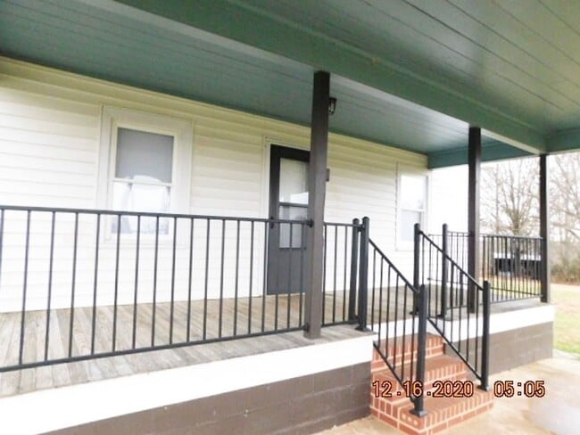 Photo - Home with 2 bedrooms, 1 bath, side deck, carport with side porch and detached garage