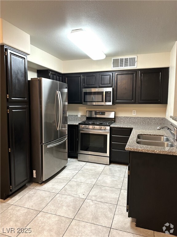 Building Photo - 5710 E Tropicana Ave Unit 1205 Rental