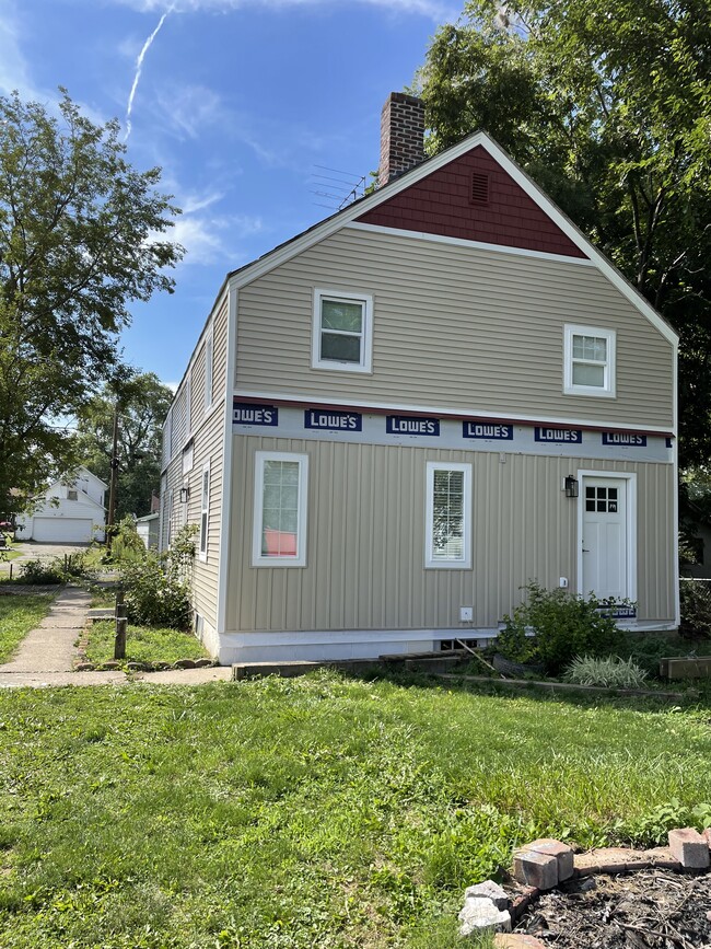 East Side where future porch will be - 55 Pearl St Townhome