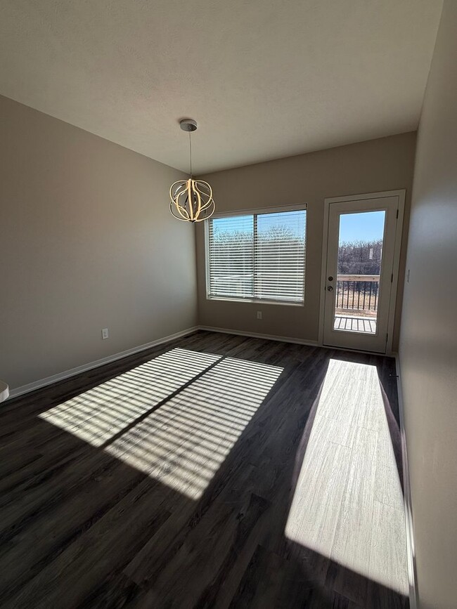 Photo - Walkout ranch townhome with 2 stall garage. Spacious 2 bedrooms with walk in closets, 2.5 bathroo...