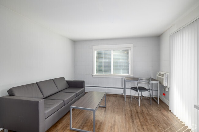 1BR, 1BA - 690SF - Living Room - Parker off Pearl