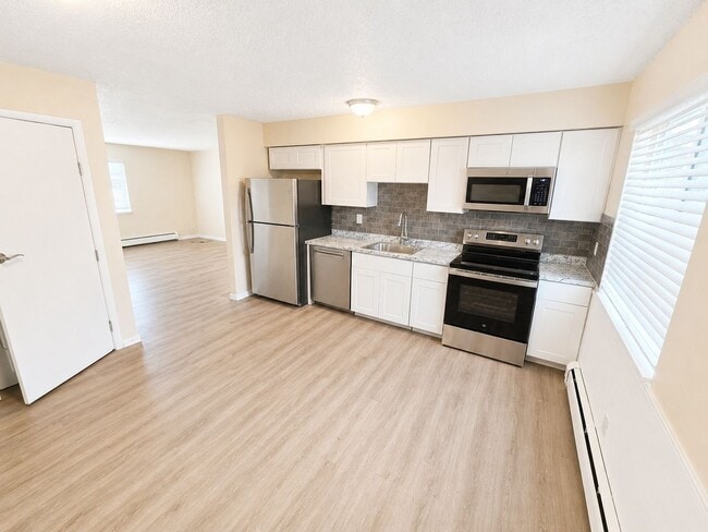 Building Photo - Available now!  Freshly updated paired home