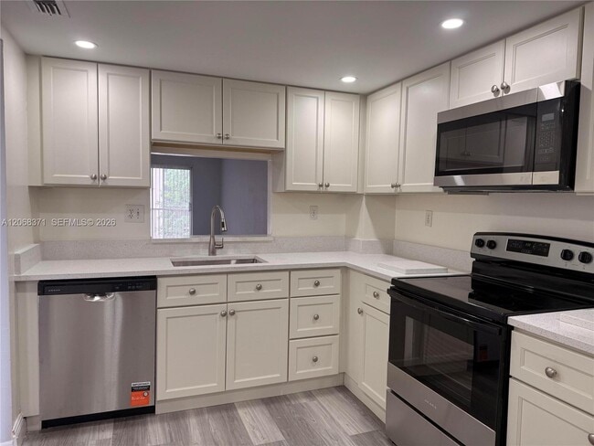 Building Photo - 1200 NW 87th Ave Unit 413