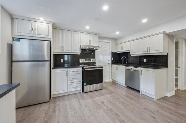 Building Photo - 7485 Hammersley Rd Unit Lower