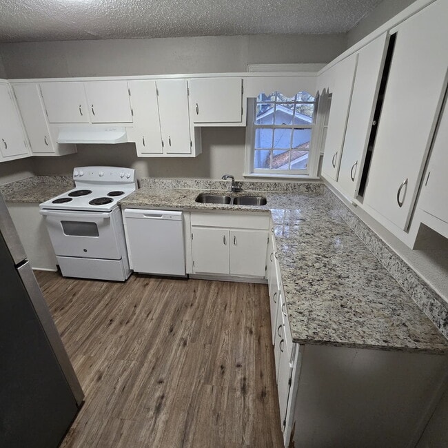 Photo - Full brick 3 bedroom, 1 and half bath home with screened in side porch, and an attic for extra st...