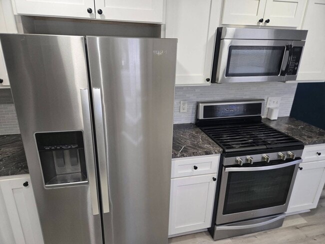 Photo - Charming 5-Bedroom Property in Prime Location