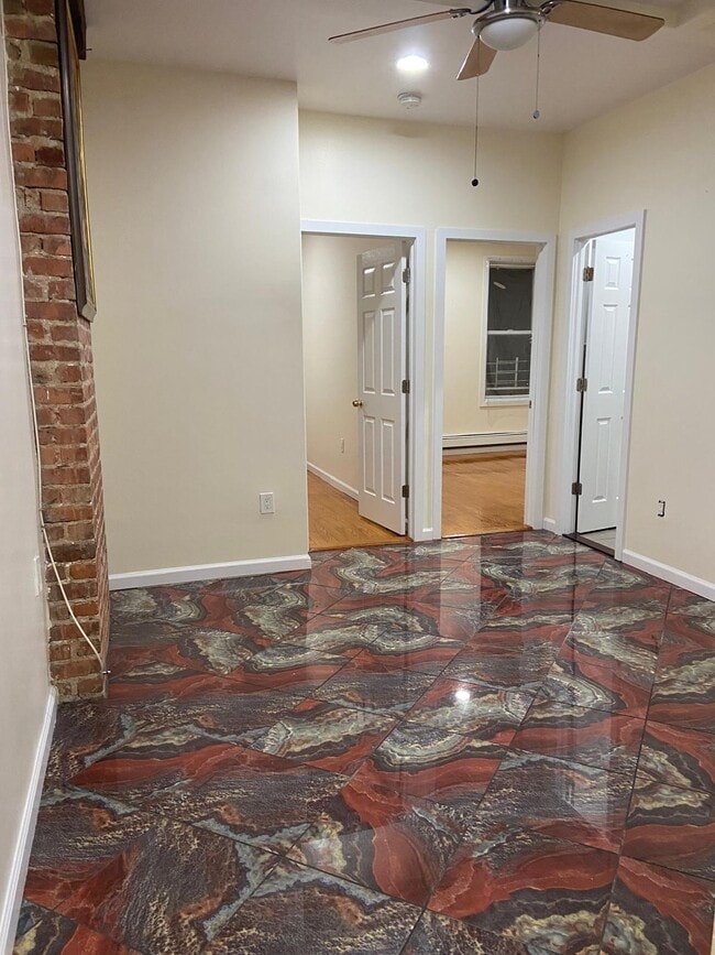 main entrance / living room - 3132 82nd St Unit 2 FL