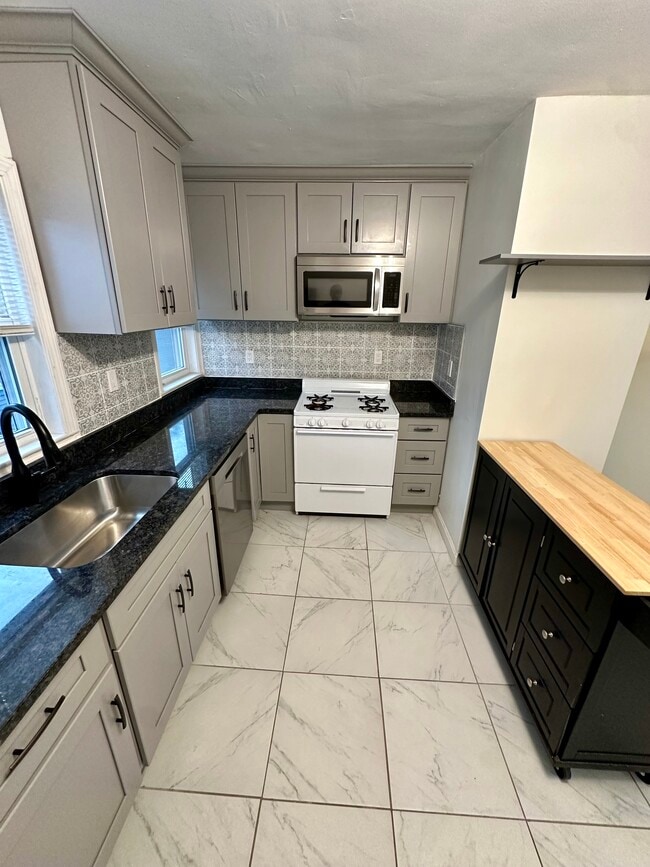 Gas stove updated (new gen. Natural Gas). - 8 Avon St Unit 8 Avon St.  2