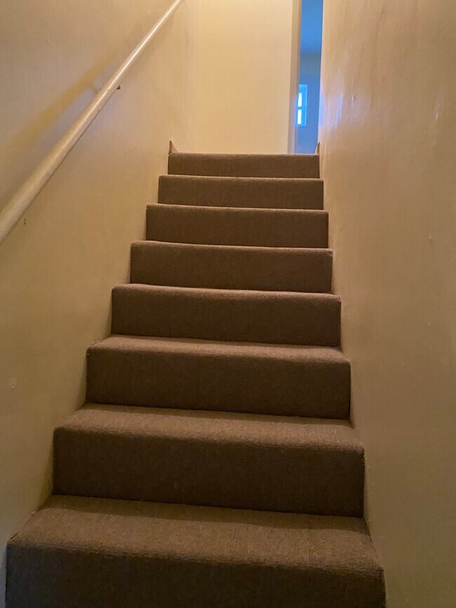 Stairwell to upstairs - Vista Oaks Townhomes