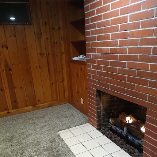 Living Room with Fireplace - 1530 Manor Dr Unit #B