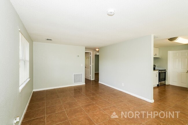 Photo - 3-Bedroom, 1 Bath Single Family for Rent in Tampa, FL | Fenced Backyard & Modern Kitchen