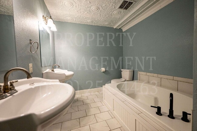 Photo - Beautifully Restored Downtown Caney, KS Apartment Unit 1