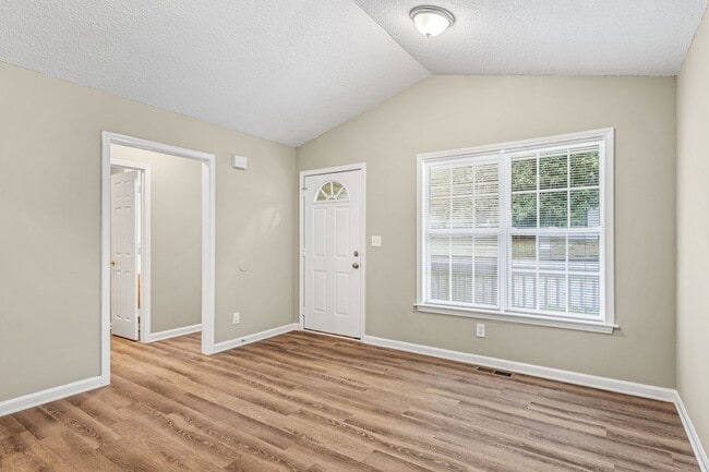 Photo - Welcome to this charming 4 bedroom, 2 bathroom home located in Greensboro, NC.