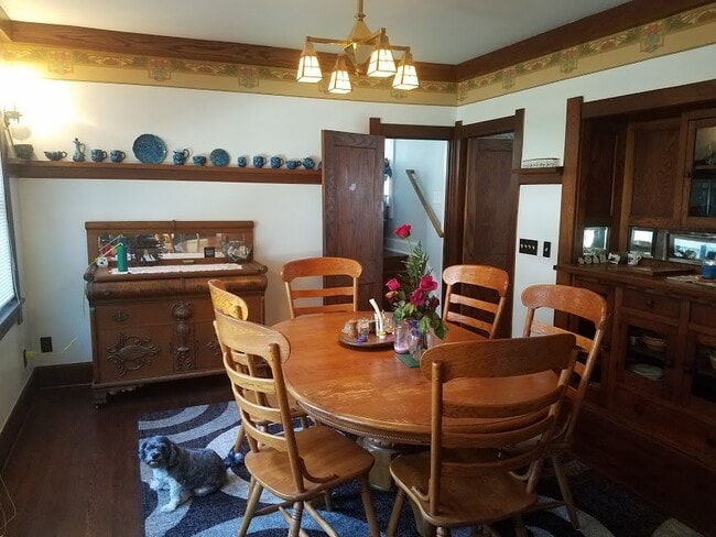 Dining room with built in china cabinet and buffet stays - 1801 E 12th St