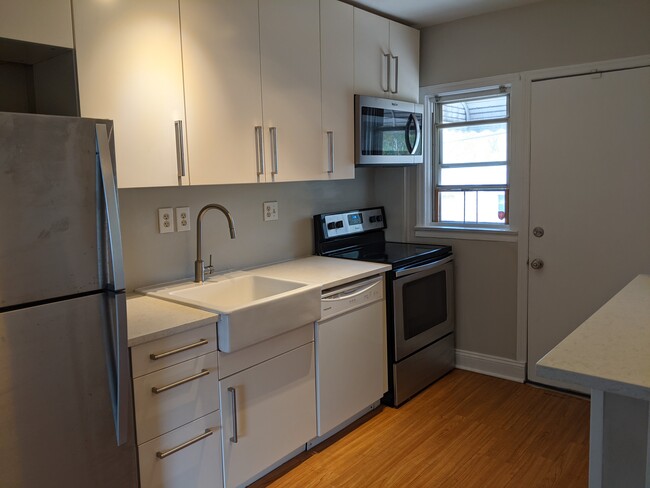 Kitchen with new quartz counters - 625 Tolna Street Townhome