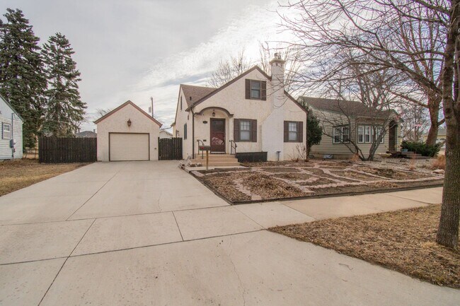 Photo - Charming 4-Bedroom Rental with Garage & Large Fenced Backyard!