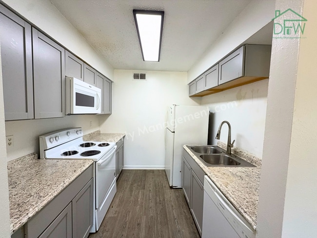 Photo - Inviting 3-Bedroom Condo with Fenced Backyard and Pool Access for LEASE in Irving, TX