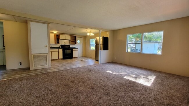 Photo - Freshly painted spacious 2-bedroom 1-bath home with a screened porch and storage shed.