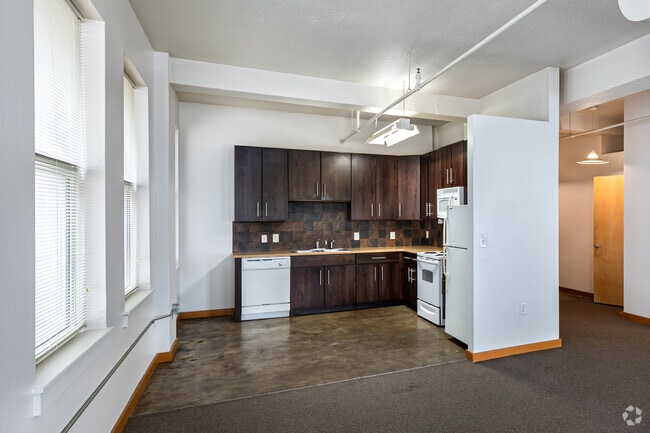 1BR, 1BA - 948SF - Living Room and Kitchen