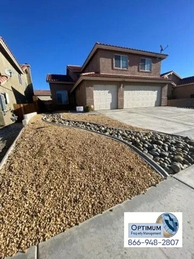 Photo - Spacious 4-Bedroom Home with 3-Car Garage ...