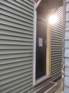 922 ½ entry on east side of building - 922 E Main St Unit 922 second floor