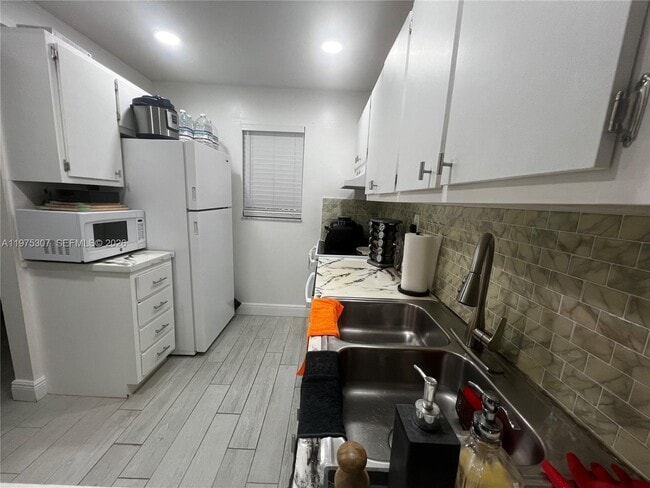 Photo - 7610 Stirling Rd Unit 108-B