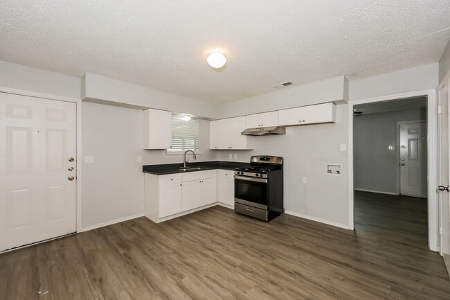 Photo - 2 BR/1BA | Newly Renovated Single Family Home | 1-Car Covered Parking | Gated backyard