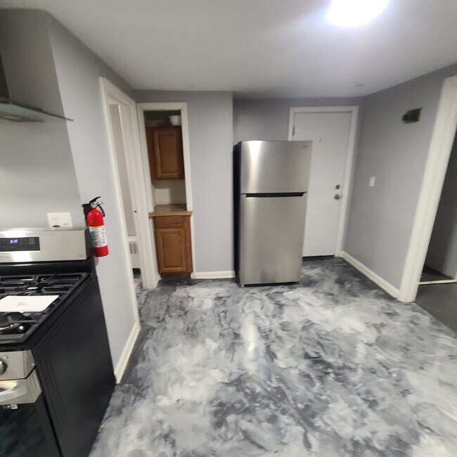 Kitching and front door from the levingroom view - 236 2nd Ave Unit B