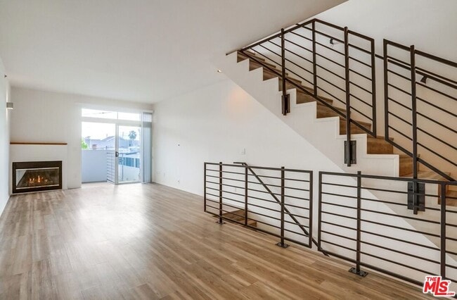 Building Photo - 11960 Iowa Ave Unit 10