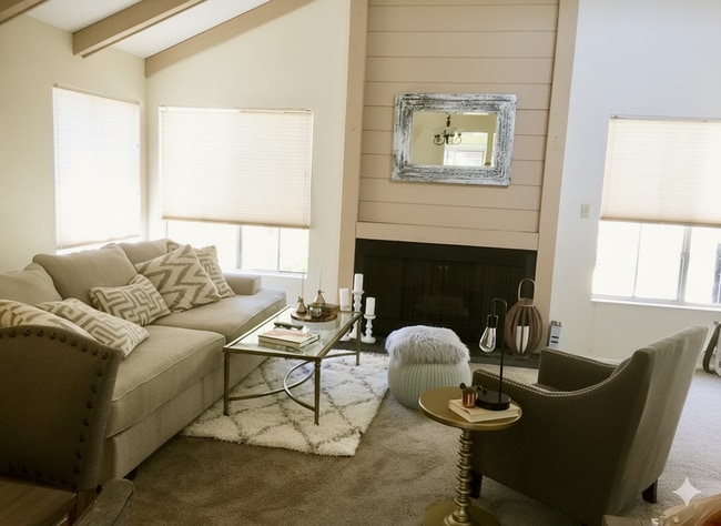 Living room (fireplace is decorative only) - 4904 Maytime Ln Unit 4904