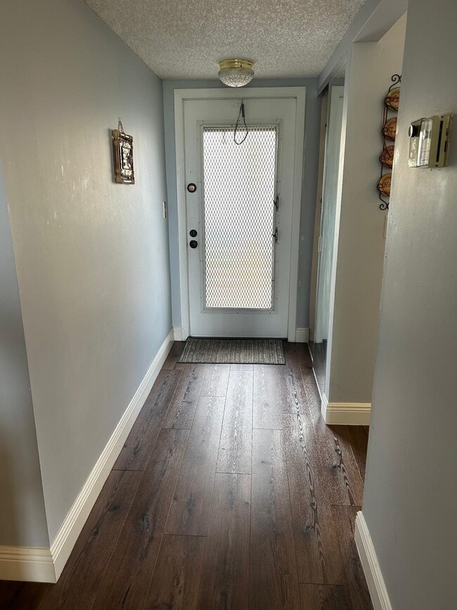 Building Photo - 6670 Royal Palm Blvd Unit 112k