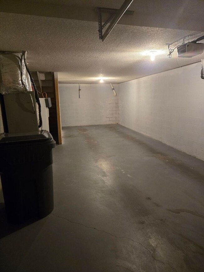 Photo - Spacious 2-Bedroom Townhome – End Unit with Private Deck & Garage