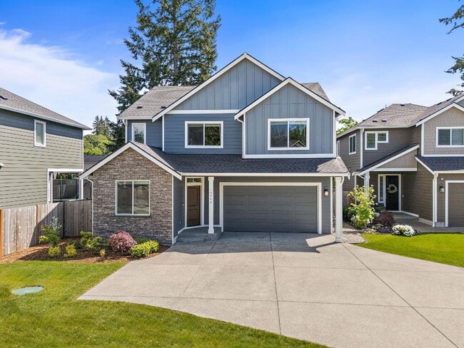 Building Photo - Modern 4-Bedroom Yelm Home with Covered Patio, Outdoor Fireplace & Office/Flex Space!