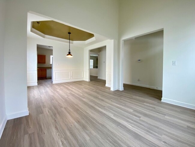 Photo - 1/2 MONTH FREE! ?Upgraded 4BR with Brand New Flooring & Private Backyard – Available Feb 15