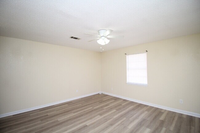 Photo - 4-Bedroom, 2-Bath Home with Large Fenced Yard