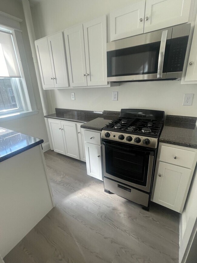 Photo - NO FEE Brand New Beautiful Split 2 bed with Stainless Kitchen, New Floors Sunny NICE ONE!  NO FEE