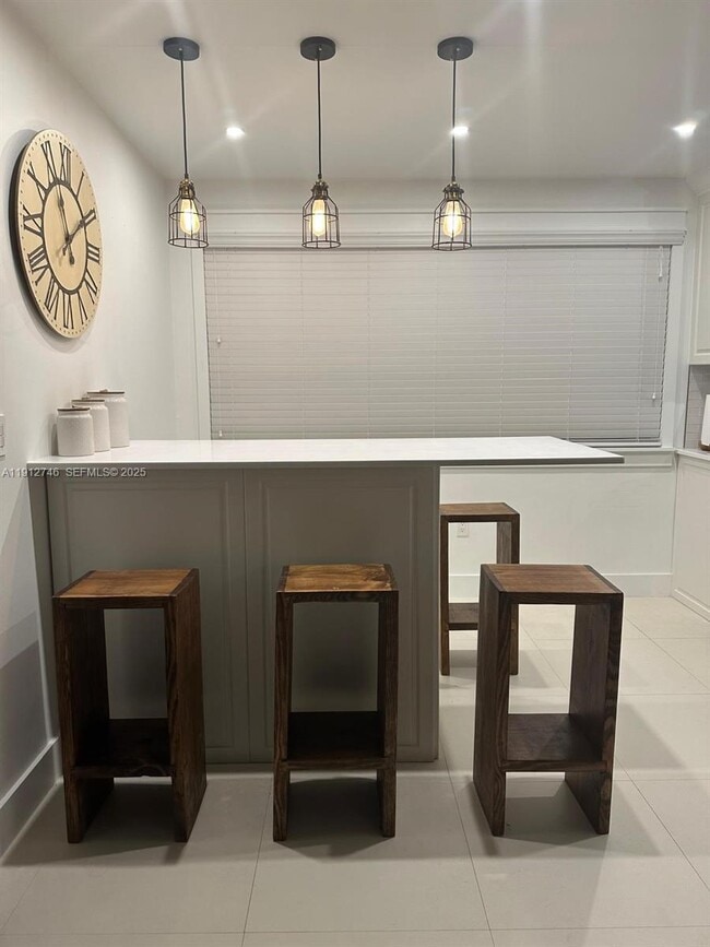 Building Photo - 10040 NW 9th St Cir Unit 202