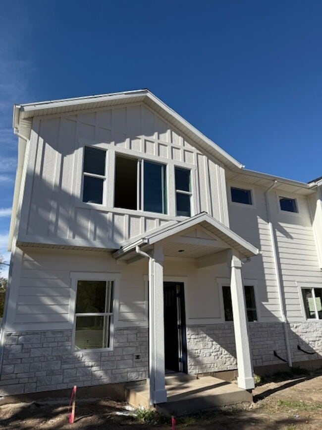 Photo - Half off first months rent - Beautiful townhome with 2 car garage, Central Air and Master Suite