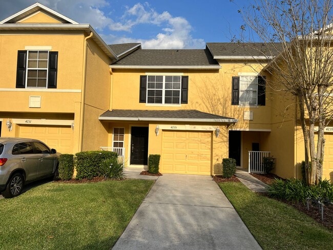Building Photo - Bright 2BR 2.5BA Home w/ Community Pool/Playground Access • Full-Size Appliances • 1-Car Garage i...