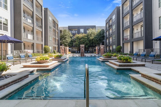 Resort-style swimming pool with tanning areas - ICON at Ross