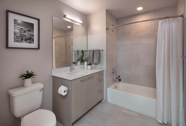 Spa bathroom with light custom European cabinetry