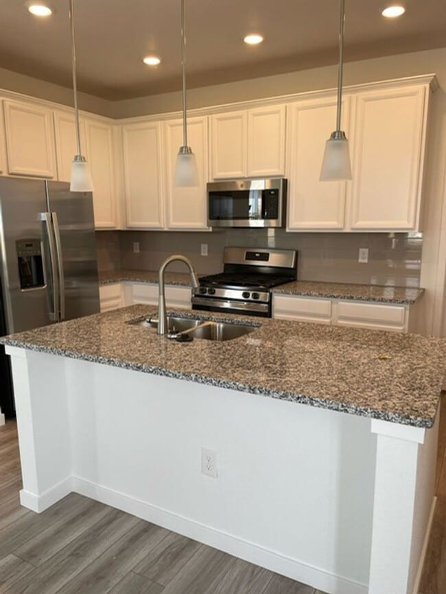 Photo - Spacious 4 Bed Townhome with 2-Car Garage in Erie-Available June 1!