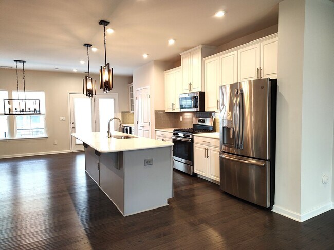 Photo - Pristine, 4 bed, 3.5 bath Townhome Located in the Kee Court Community!