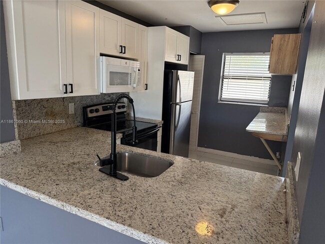 Photo - 842 NE 209th St Condo Unit 201