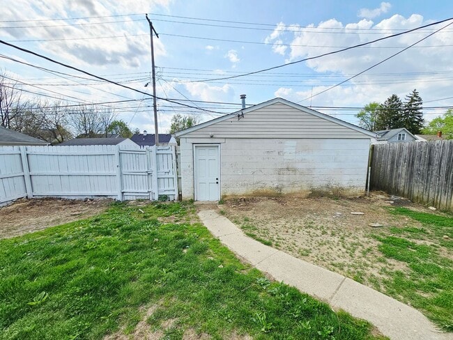 Photo - Move-In Ready 2BR/1BA Home w/ 2-Car Garage | Recently Updated